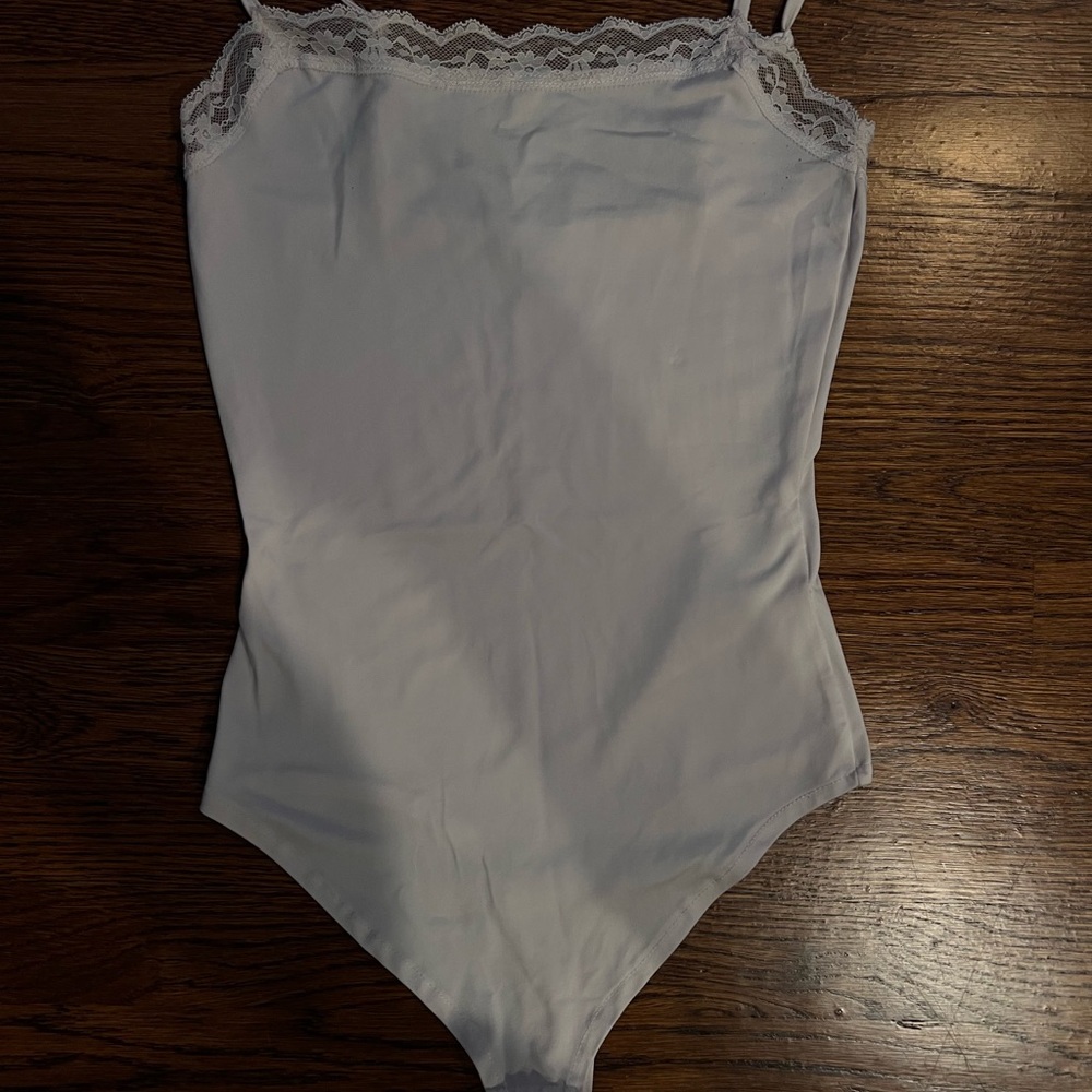 Chic White Lace-Trimmed Bodysuit